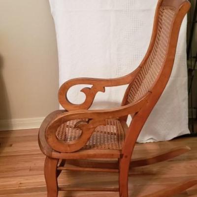 Antique Lincoln Cane back rocking chair