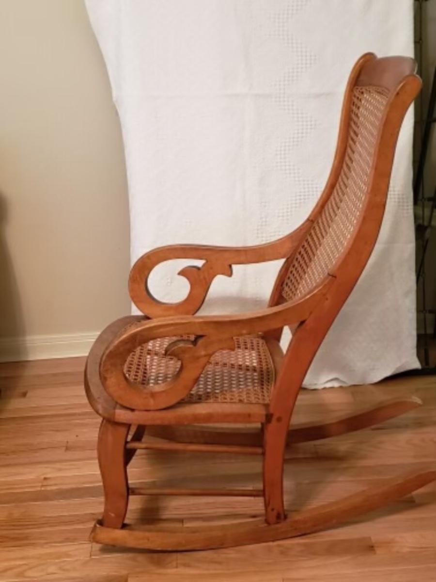 Antique Lincoln Cane back rocking chair