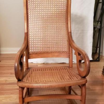 Antique Lincoln Cane back rocking chair