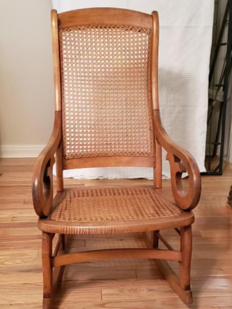 Antique Lincoln Cane back rocking chair