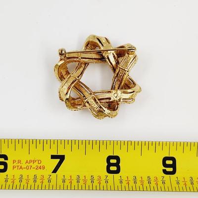 VINTAGE LISTNER GOLD TONED WRAPPED STAR BROOCH
