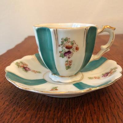 Vintage beautiful demitasse teacups and saucers.