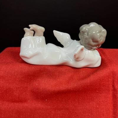 Lladro    Angel Laying Down