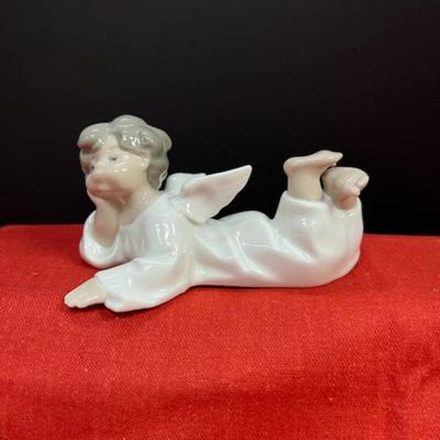 Lladro    Angel Laying Down