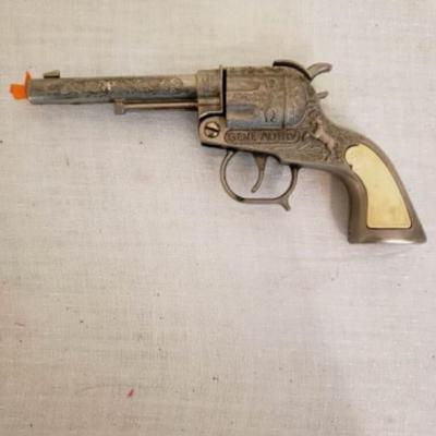 Gene Autry toy cap pistol 1950s â€” Rearing horse grip with BH, Buzz Henry emblem
