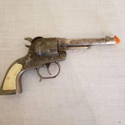 Gene Autry toy cap pistol 1950s â€” Rearing horse grip with BH, Buzz Henry emblem