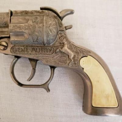 Gene Autry toy cap pistol 1950s â€” Rearing horse grip with BH, Buzz Henry emblem