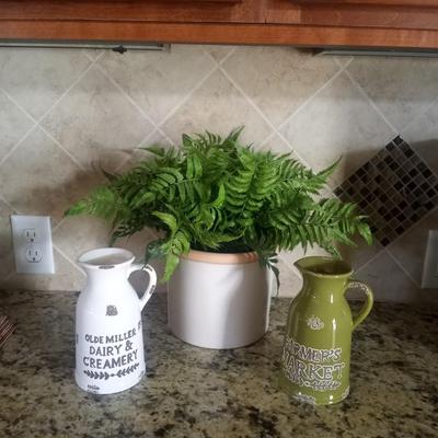 TWO CERAMIC CREAMERS AND FAUX POTTED PLANT