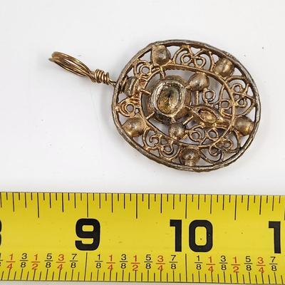 ECLECTIC GOLD TONED & AMETHYST HAND CRAFTED PENDANT