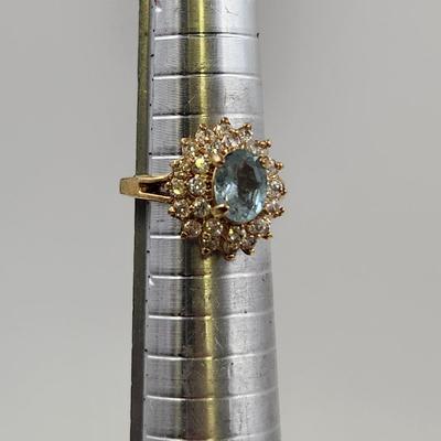 BEAUTIFUL FAUX AQUAMARINE GOLD TONED RING SIZE 6