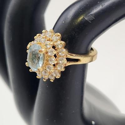 BEAUTIFUL FAUX AQUAMARINE GOLD TONED RING SIZE 6