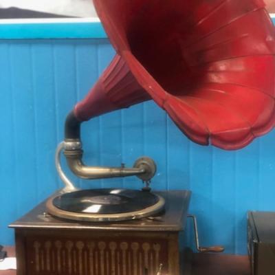Working Gramophone with a box of records.