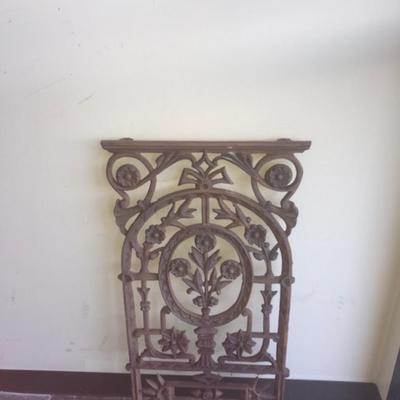 heavy cast Iron grate with flowers