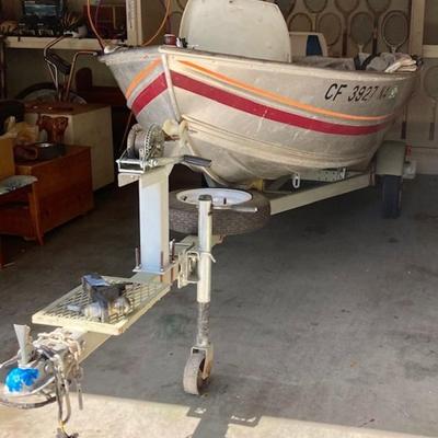 1990 Western Fishing Boat With Johnson 9.9 HP Motor And 1987 Tomco Coated Trailer