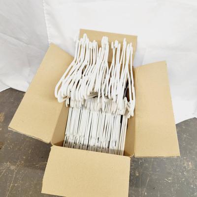 69 WHITE PLASTIC NICE HANGERS