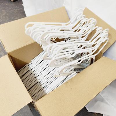 69 WHITE PLASTIC NICE HANGERS