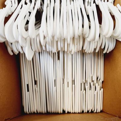 77 WHITE PLASTIC NICE HANGERS