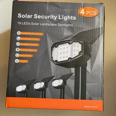 NEW - 4 piece solar security lights