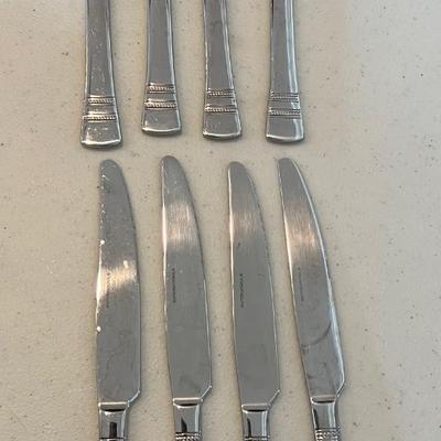 42 piece International Stainless China Set