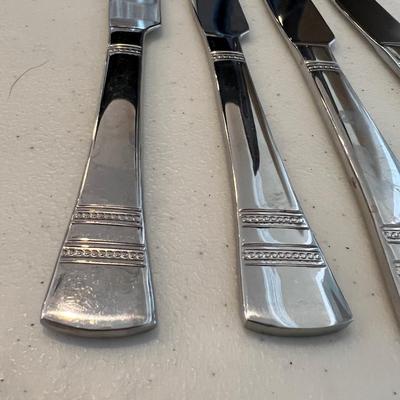 42 piece International Stainless China Set