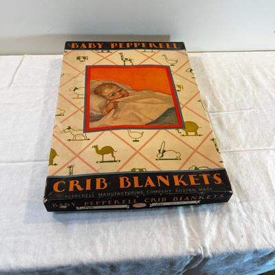 Baby Crib Graphic Box with Hand Crafted Baby Gowns for new baby.