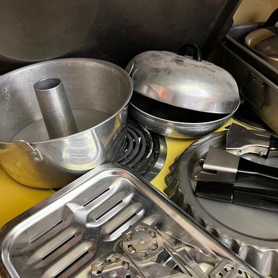 Stovetop Full of Cookware Pots and Pans 