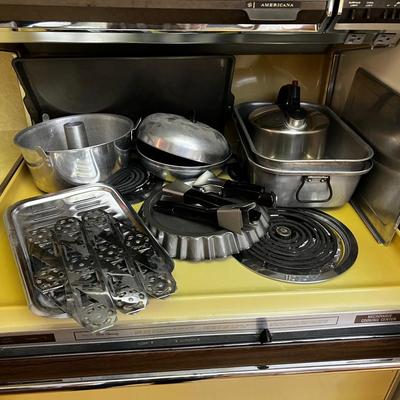 Stovetop Full of Cookware Pots and Pans 