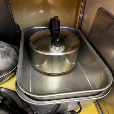 Stovetop Full of Cookware Pots and Pans 