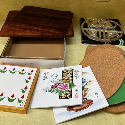 Lot of Trivets and Cutting Boards