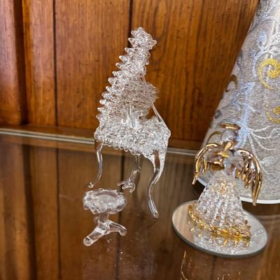 Hand Blown Glass Angles and a piano