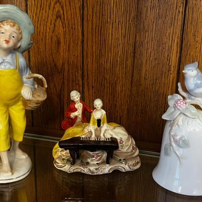 Ceramic Figurines and a bell