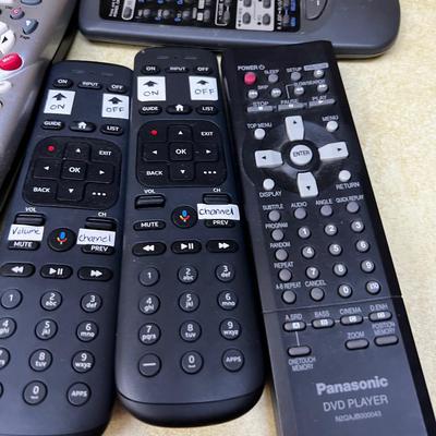 Large Pile of Remote Controls 