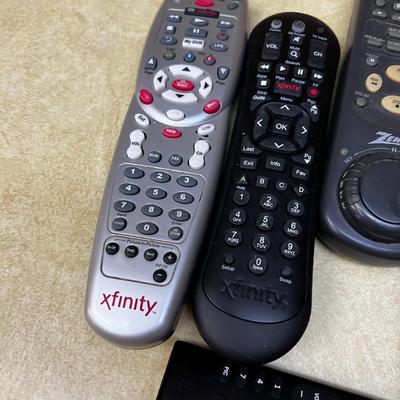 Large Pile of Remote Controls 