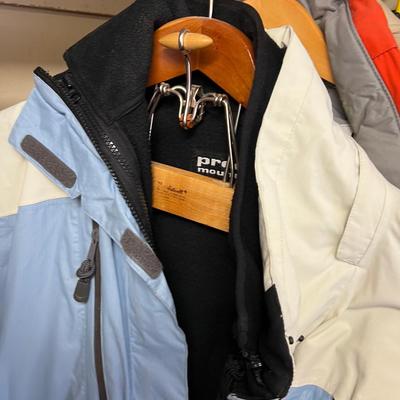 Closet Full of Coats; Men's and Women's