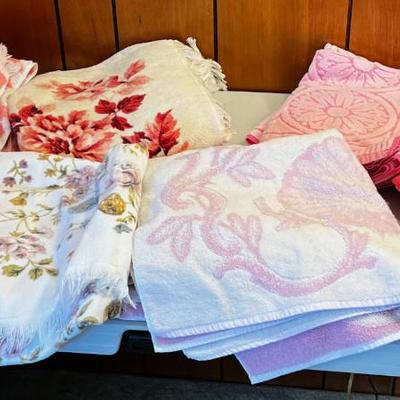 Pile of Patterned Pink Towels 
