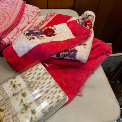 Pile of Patterned Pink Towels 