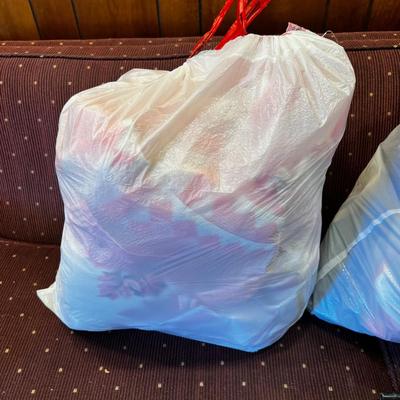 Pile of Patterned Pink Towels 