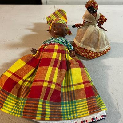 A Doll and a Bell that looks like a Doll