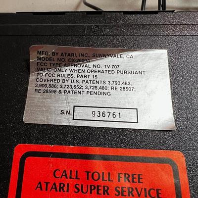 Atari Video Console with 2 game controllers