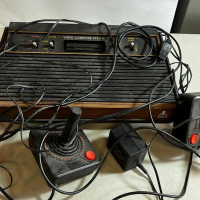 Atari Video Console with 2 game controllers