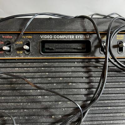 Atari Video Console with 2 game controllers