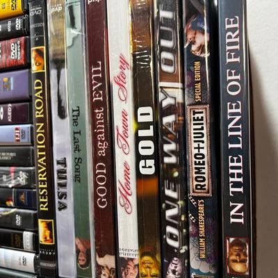 Tray of DVD Mostly Drama and Action Movies 