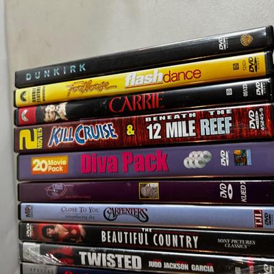 Tray of DVD Mostly Drama and Action Movies 