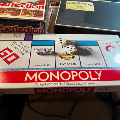 5 Board Games: Bermuda Triangle Monopoly, Perfection. Etc.