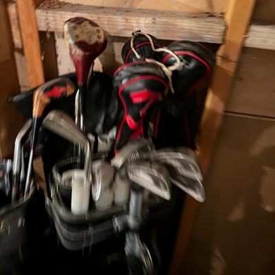Pile of  Golf Clubs