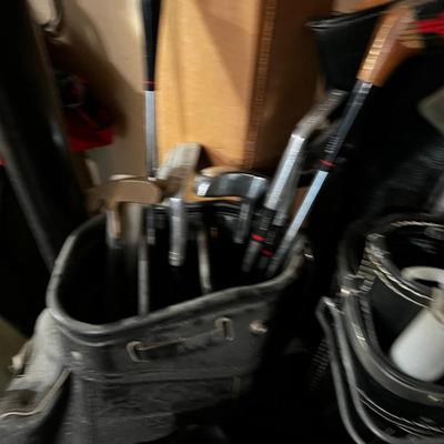 Pile of  Golf Clubs