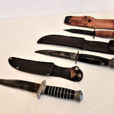 Lot #117  Lot of 3 Hunting/Trail Knives with sheaths