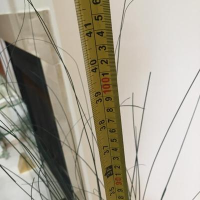 80's floor vase with grasses.