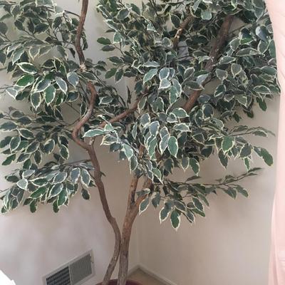 Fabric tree in plastic pot.