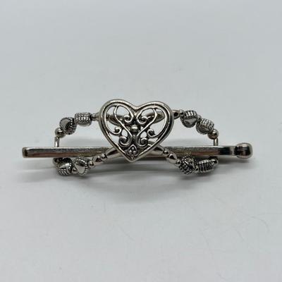 LOT 16: Five Assorted Clips